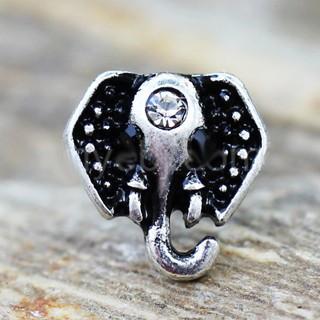 A beautifully designed 316L stainless steel cartilage earring featuring an elephant head adorned with clear and black cubic zirconia stones.