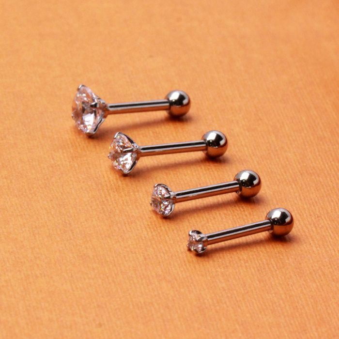 A stylish 316L stainless steel prong set CZ triple helix cartilage earring featuring clear cubic zirconia stones.