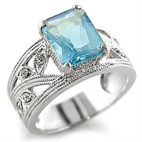 A high-polished 925 sterling silver ring featuring a sea blue synthetic spinel, showcasing elegance and craftsmanship.