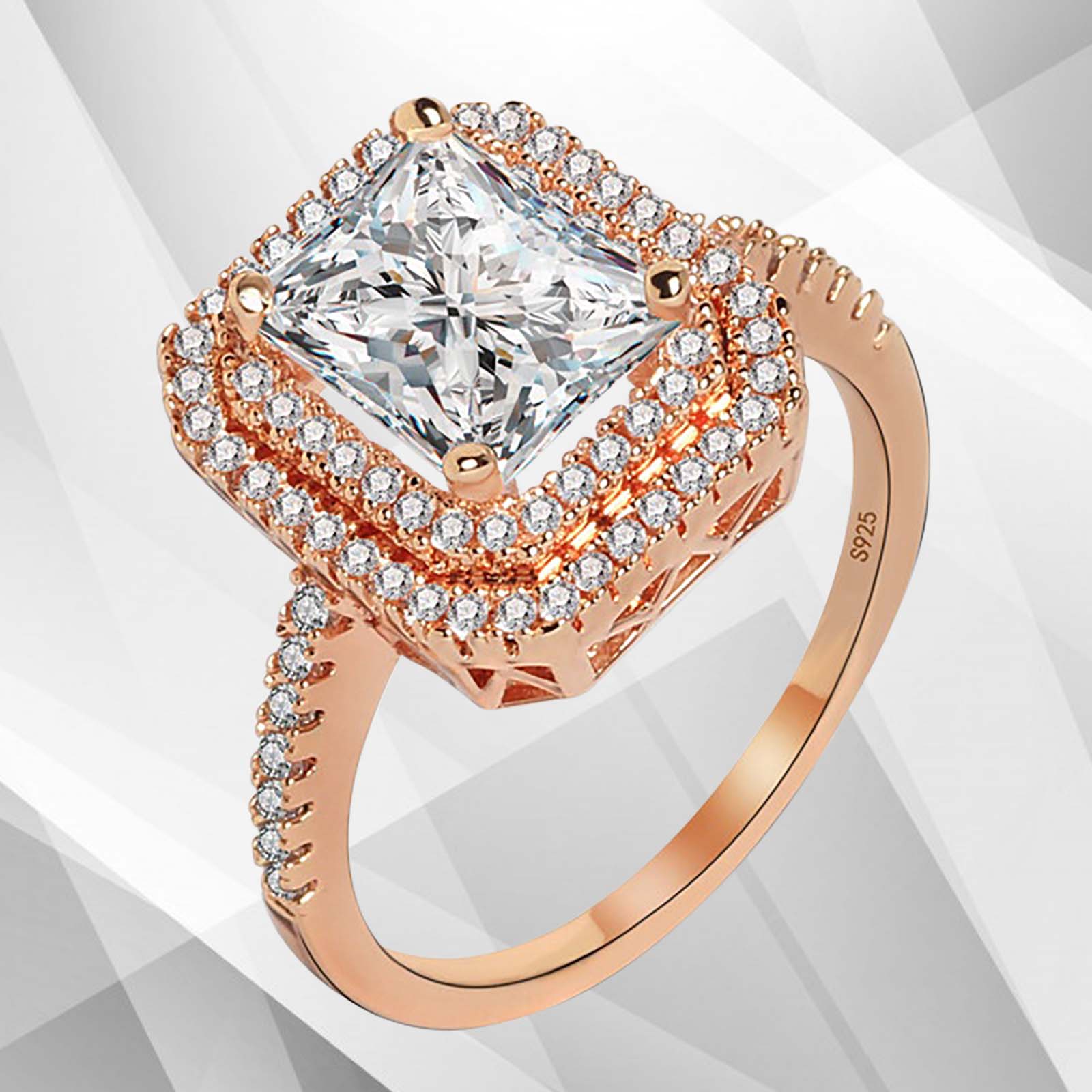 3.2Ct CZ Diamond Cushion Halo Bridal Engagement Ring in 18Ct Rose Gold, featuring a sparkling pave setting and a luxurious design.