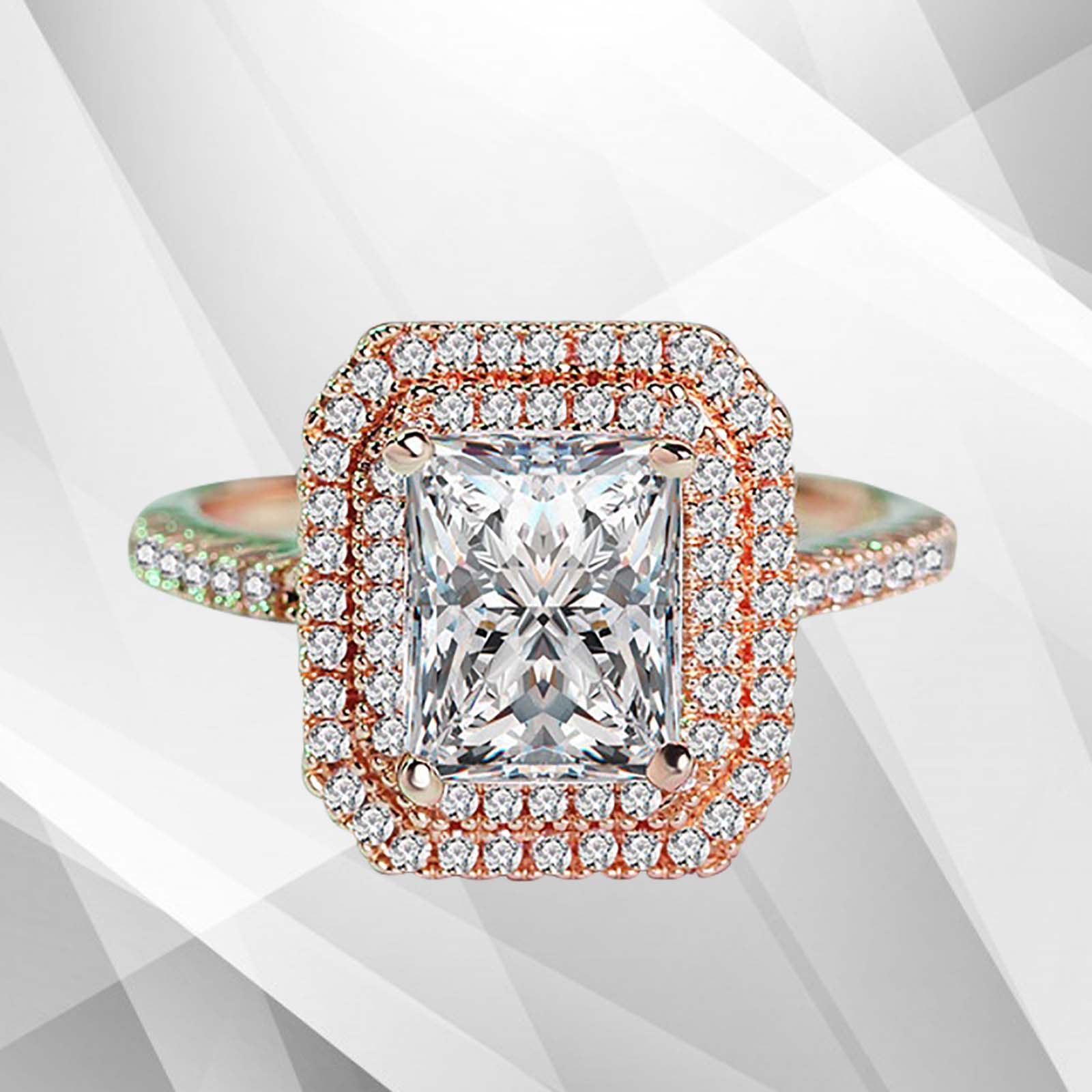 3.2Ct CZ Diamond Cushion Halo Bridal Engagement Ring in 18Ct Rose Gold, featuring a sparkling pave setting and a luxurious design.