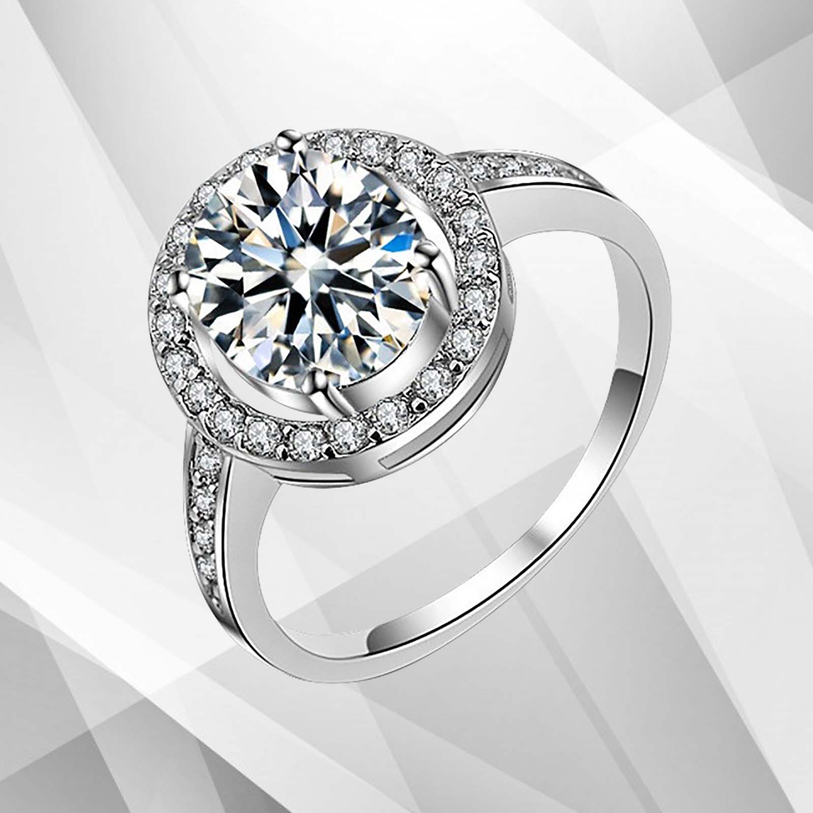 3.2Ct Round-Cut Diamond Cushion Halo Bridal Engagement Ring in 18Ct White Gold, showcasing a stunning round diamond surrounded by a halo of smaller stones.