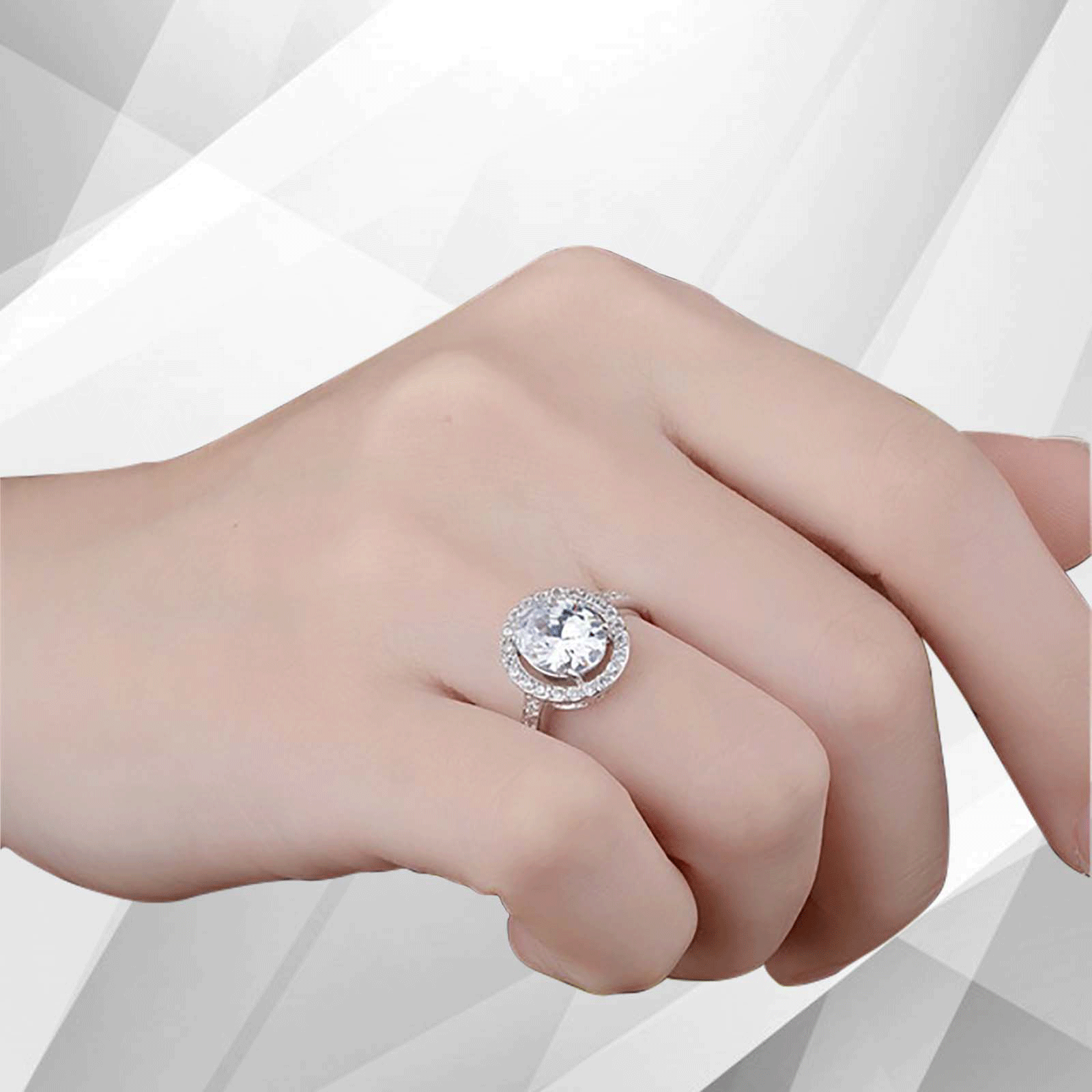 3.2Ct Round-Cut Diamond Cushion Halo Bridal Engagement Ring in 18Ct White Gold, showcasing a stunning round diamond surrounded by a halo of smaller stones.