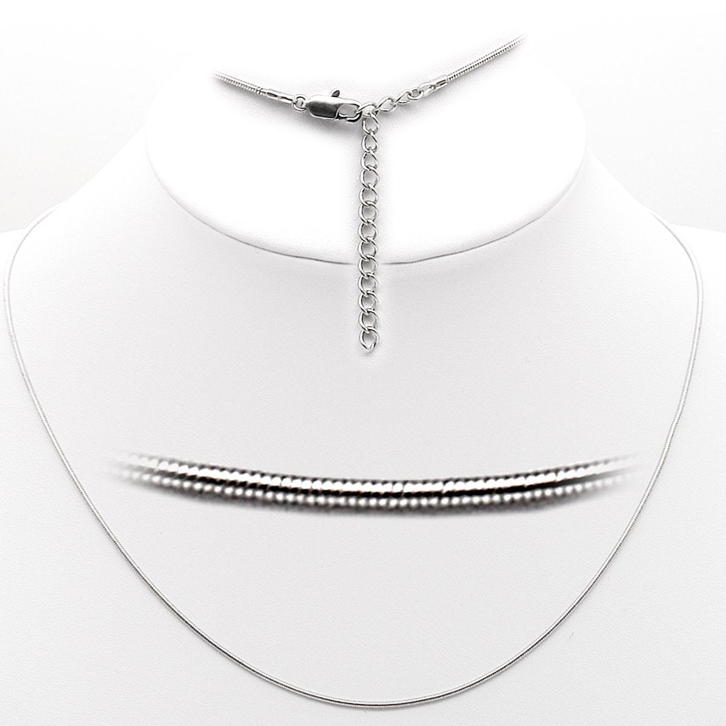 A sleek rhodium-finished brass chain, lightweight and elegant, perfect for layering or wearing alone.