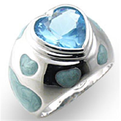 A high-polished 925 sterling silver ring featuring a sea blue synthetic spinel, showcasing elegance and craftsmanship.