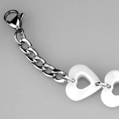 High polished stainless steel bracelet with white ceramic center stone, showcasing a sleek and modern design.