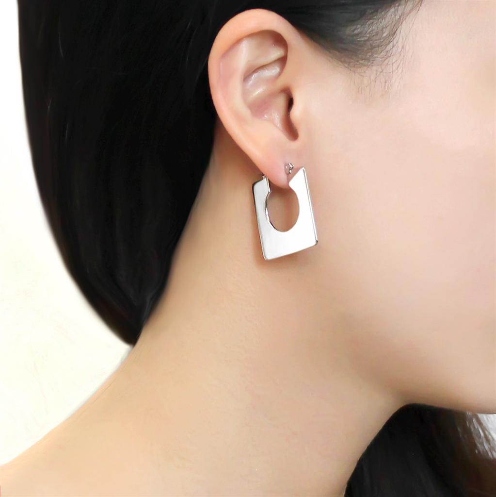 Elegant 3W1500 Rhodium Brass Earrings with a minimalist design, showcasing a shiny finish and no stone.