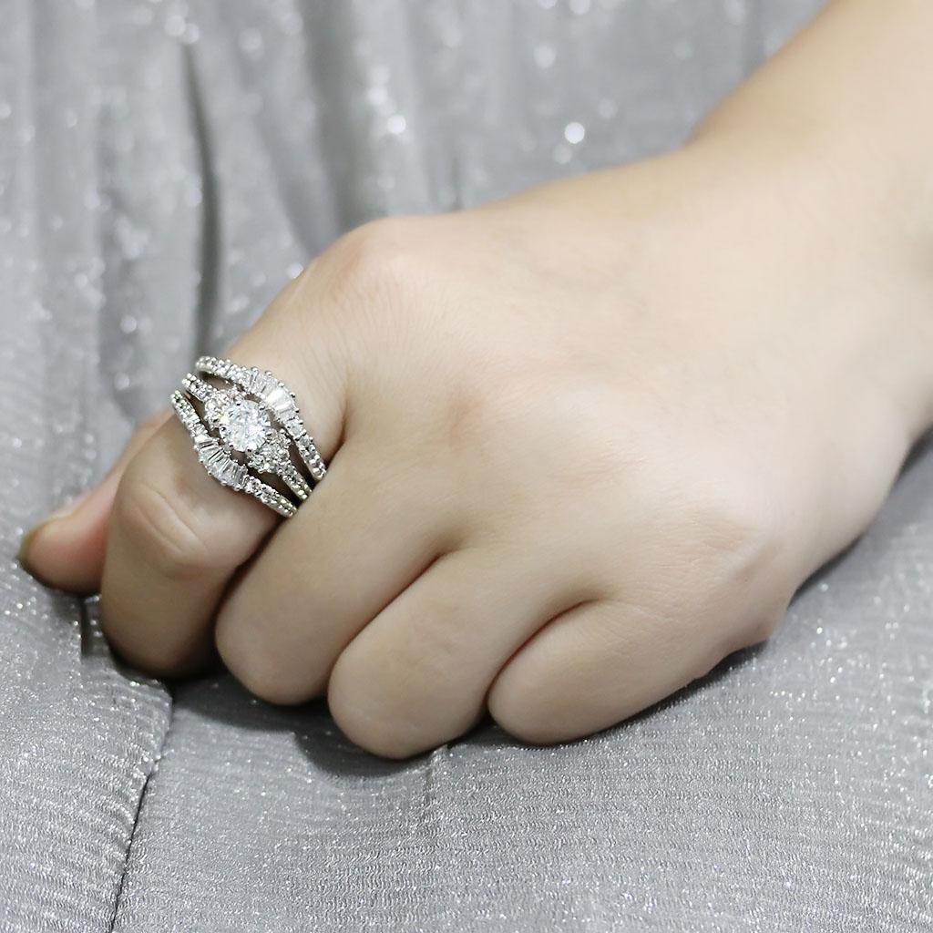 Rhodium brass ring featuring a clear AAA Grade cubic zirconia center stone, elegantly designed for any occasion.