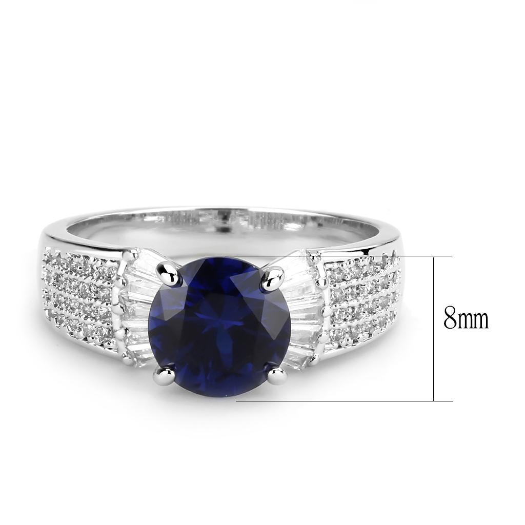 3W1562 Rhodium Brass Ring featuring a vibrant London Blue Synthetic Spinel, elegantly designed with a shiny finish.