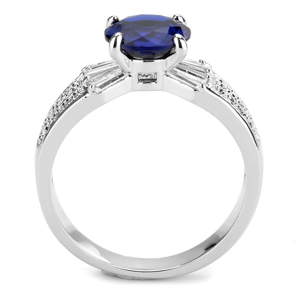 3W1562 Rhodium Brass Ring featuring a vibrant London Blue Synthetic Spinel, elegantly designed with a shiny finish.