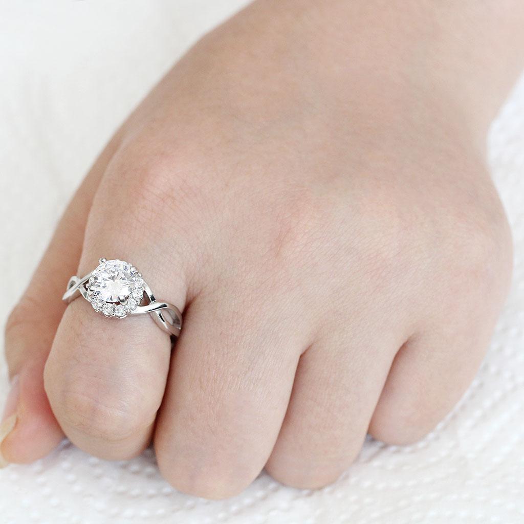 3W1575 Rhodium Brass Ring featuring a clear AAA Grade CZ stone, showcasing its elegant design and luxurious finish.