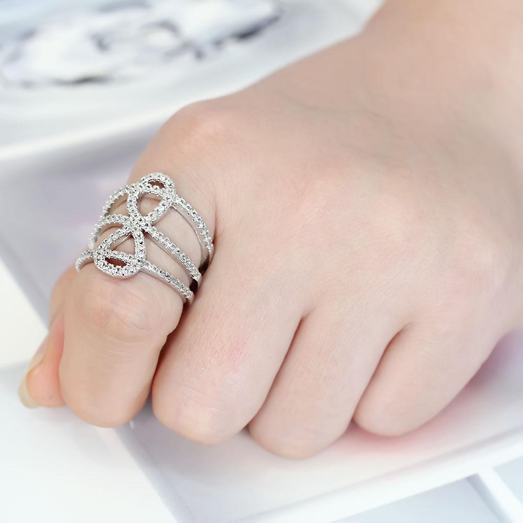 3W1587 Rhodium Brass Ring featuring a clear AAA Grade CZ stone, showcasing its elegant design and shiny finish.