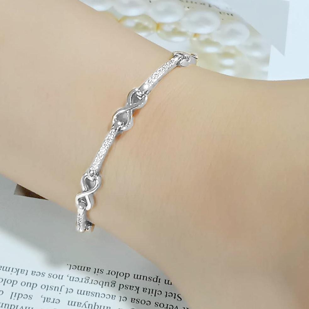 3W1631 Rhodium Brass Bracelet featuring a clear AAA Grade CZ stone, showcasing its elegant design and luxurious finish.