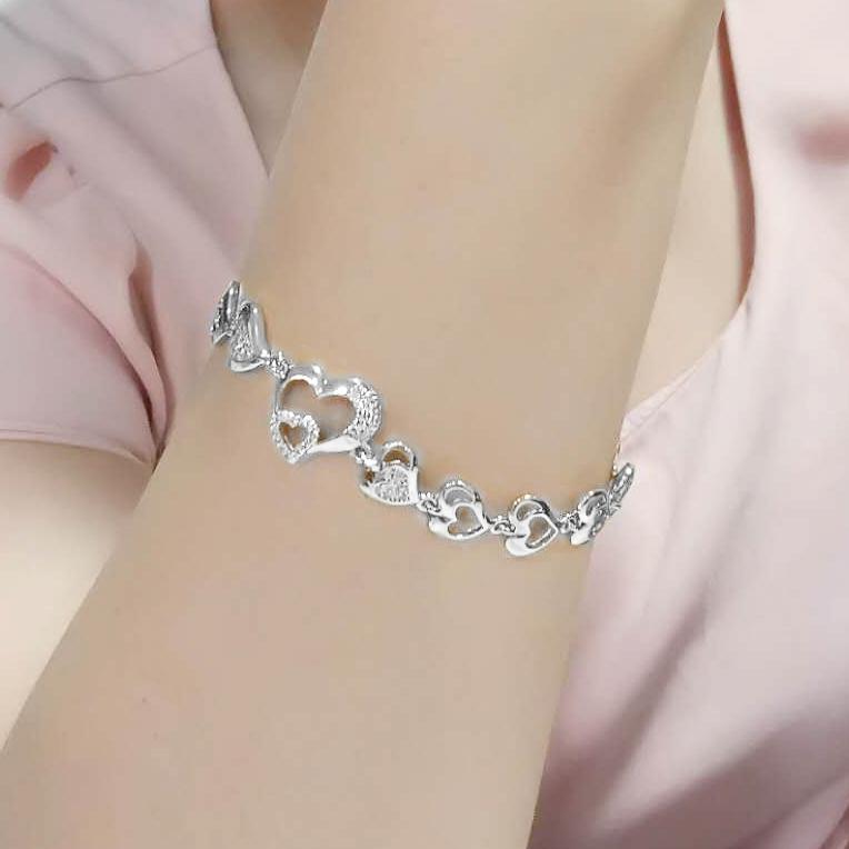 3W1634 Rhodium Brass Bracelet featuring AAA Grade Clear CZ stones, showcasing its elegant design and luxurious finish.