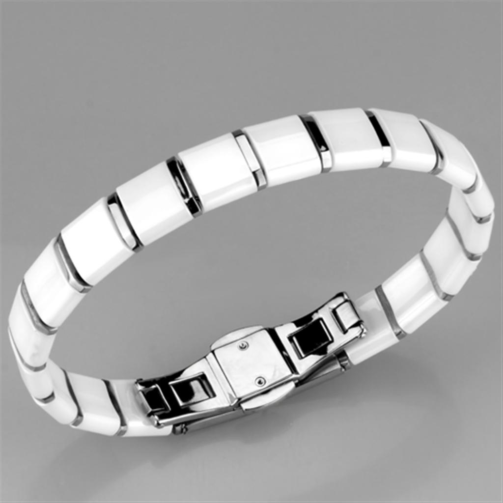 High polished stainless steel bracelet featuring a white ceramic center stone, showcasing elegance and durability.