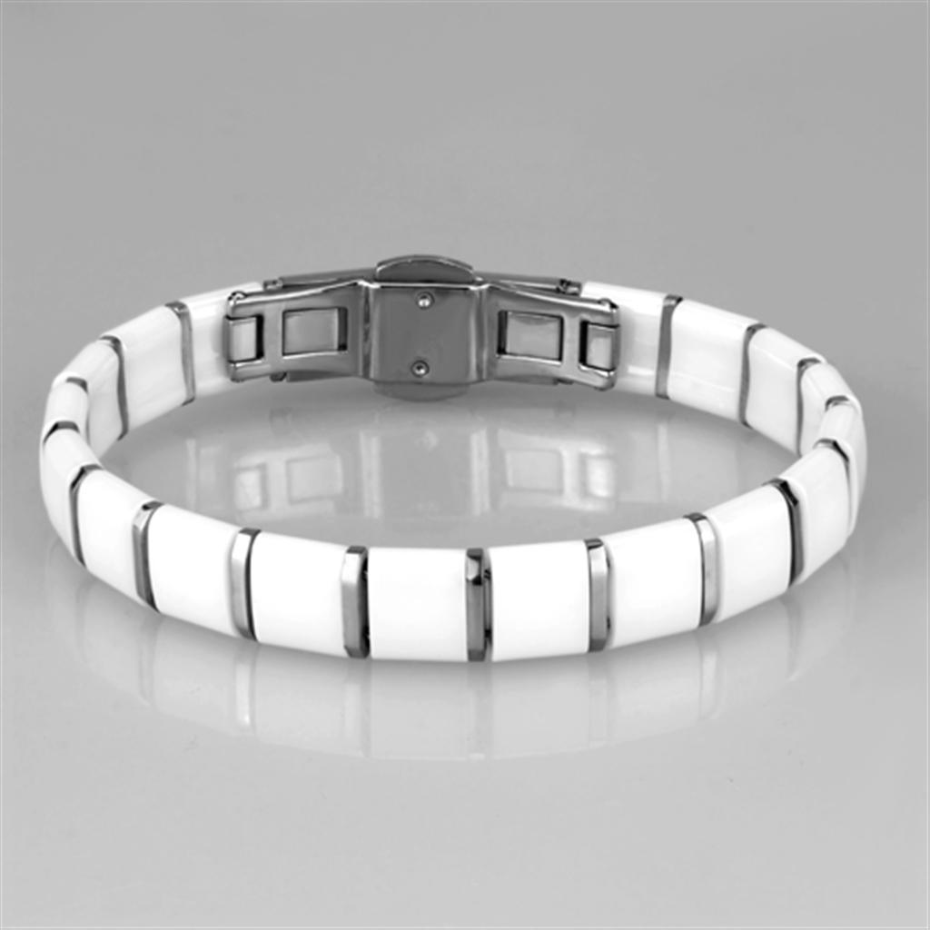 High polished stainless steel bracelet featuring a white ceramic center stone, showcasing elegance and durability.