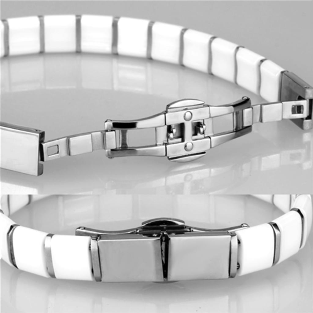 High polished stainless steel bracelet featuring a white ceramic center stone, showcasing elegance and durability.