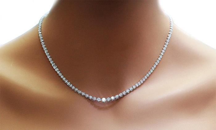 A luxurious 42.00 CTTW Cubic Zirconia Tennis Necklace featuring 98 round cut crystals set in 18K white gold plating.