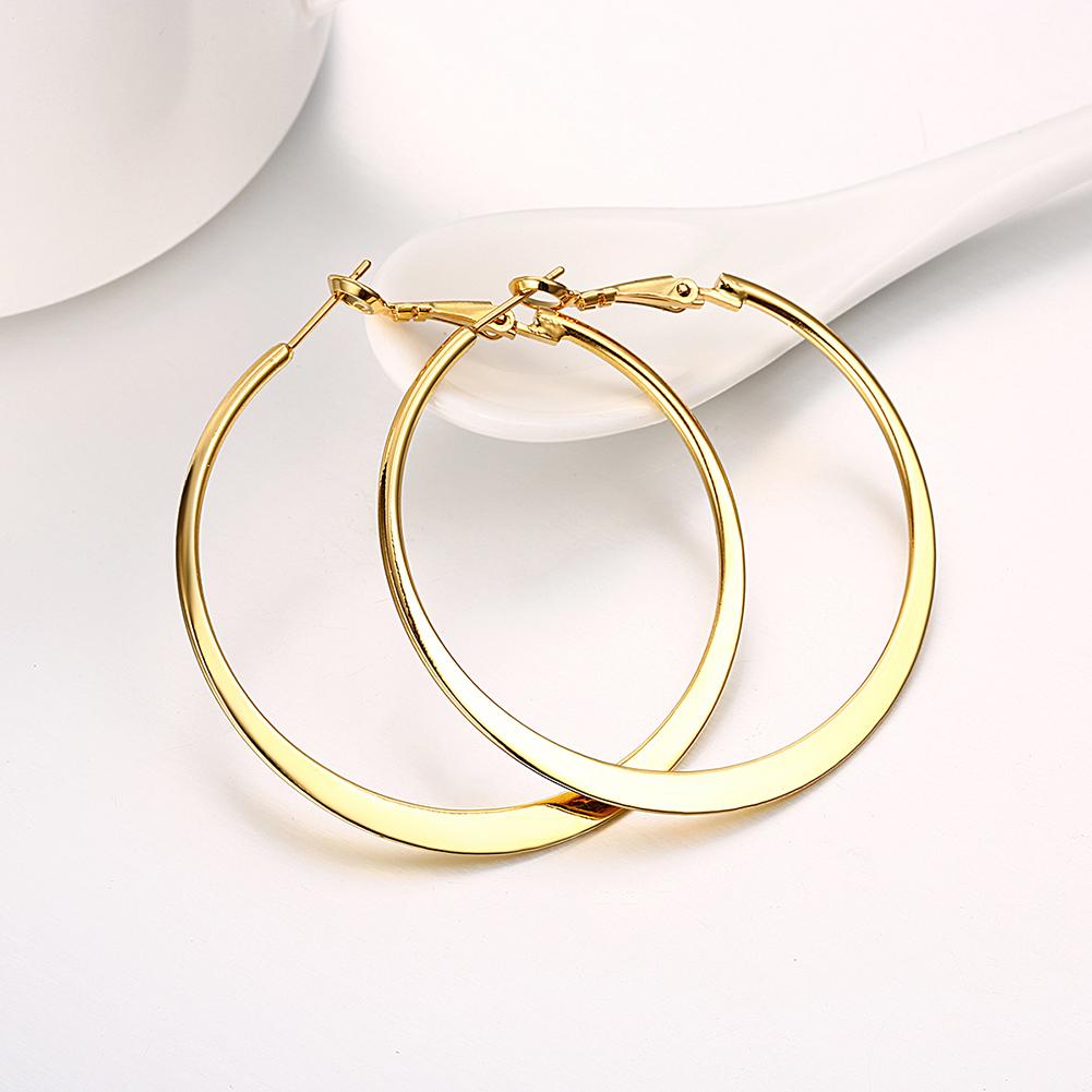 A pair of elegant 42mm flat hoop earrings in 18K gold plating, showcasing a sleek and modern design.