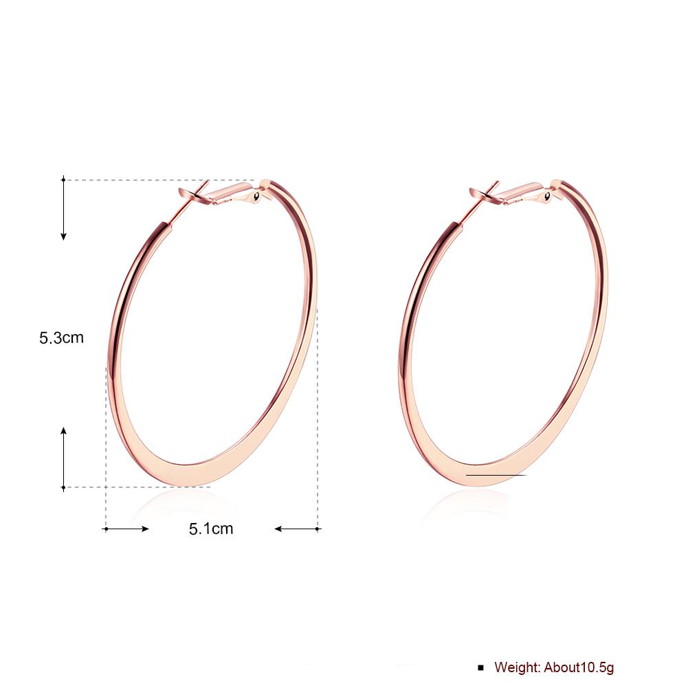 A pair of elegant 42mm flat hoop earrings in 18K rose gold plating, showcasing their shiny finish and comfortable design.