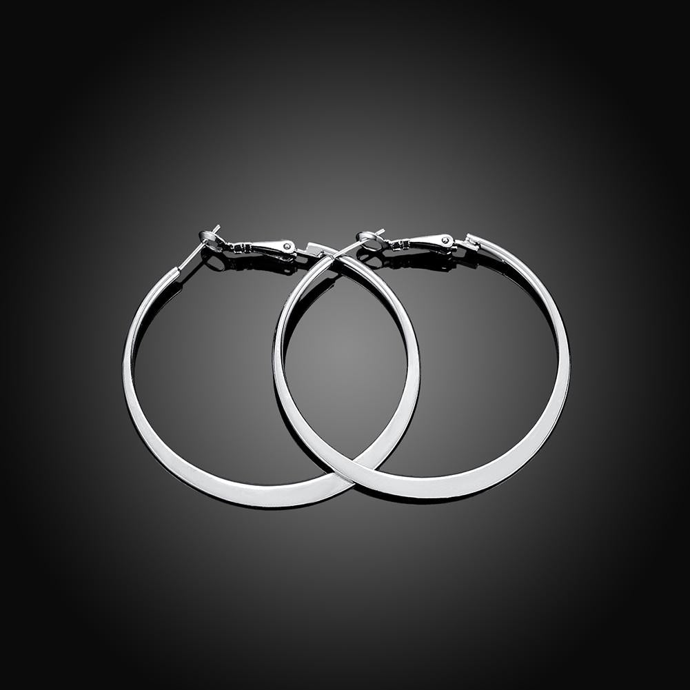 Elegant 42mm flat hoop earrings in 18K white gold plating, showcasing a shiny and sophisticated design suitable for any occasion.