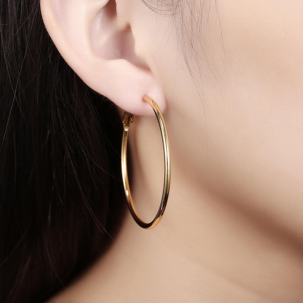 A pair of elegant 42mm round hoop earrings in 18K gold plating, showcasing a shiny and sophisticated design.