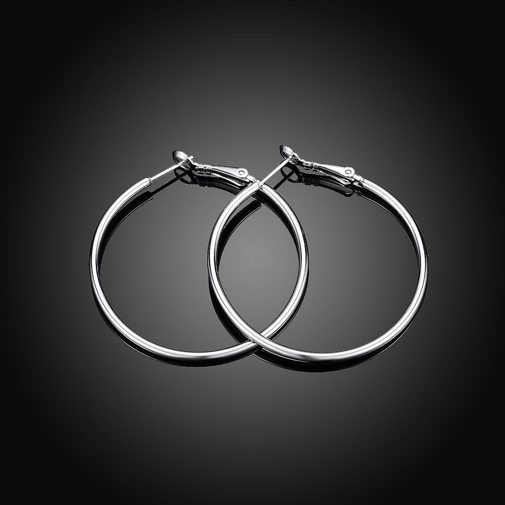 A pair of elegant 42mm round hoop earrings crafted in 18K white gold plating, showcasing a shiny and sophisticated design.