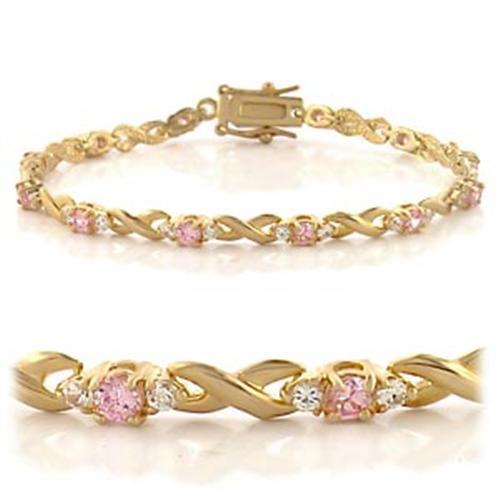 Gold brass bracelet featuring a rose-colored AAA grade cubic zirconia stone, elegantly designed for stylish wear.