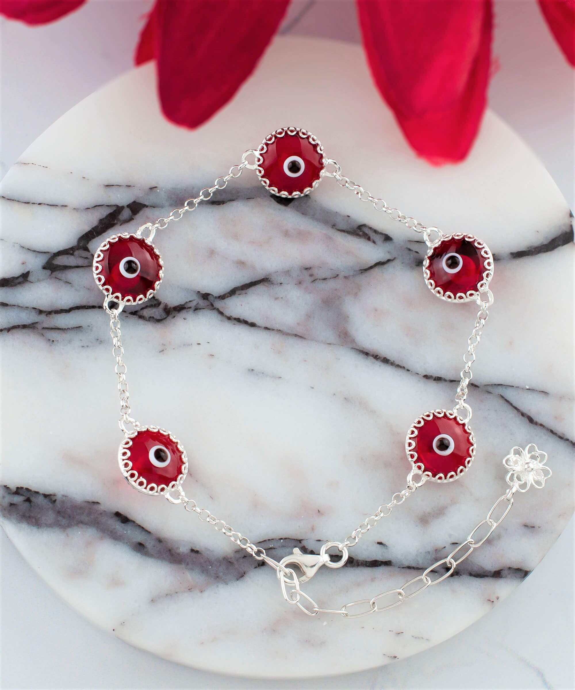 A stylish 5 Beads Red Evil Eye Women Silver Link Bracelet featuring five red evil eye beads wrapped in silver prongs on a rolo chain.