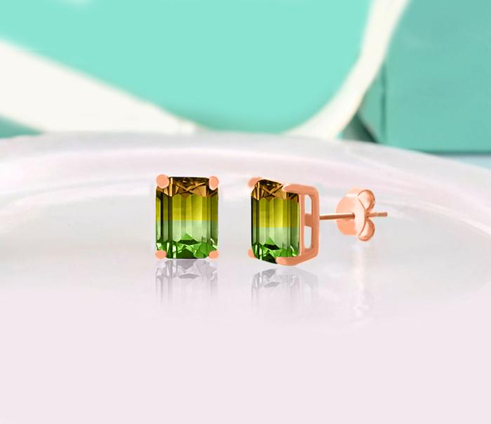 Elegant 5.00 Ctw Emerald Cut Citrine and Emerald Stud Earrings set in 18K Rose Gold, showcasing their vibrant colors and luxurious design.