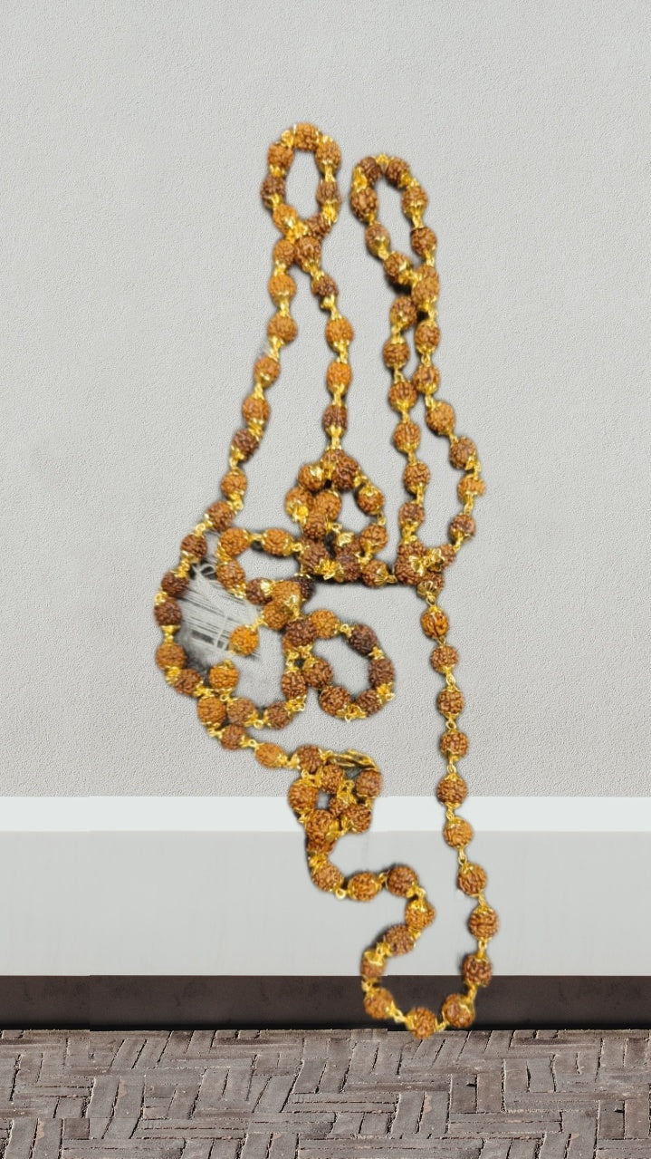 A beautifully crafted 54 Rudraksha Beads Mala with golden caps, symbolizing spirituality and elegance.