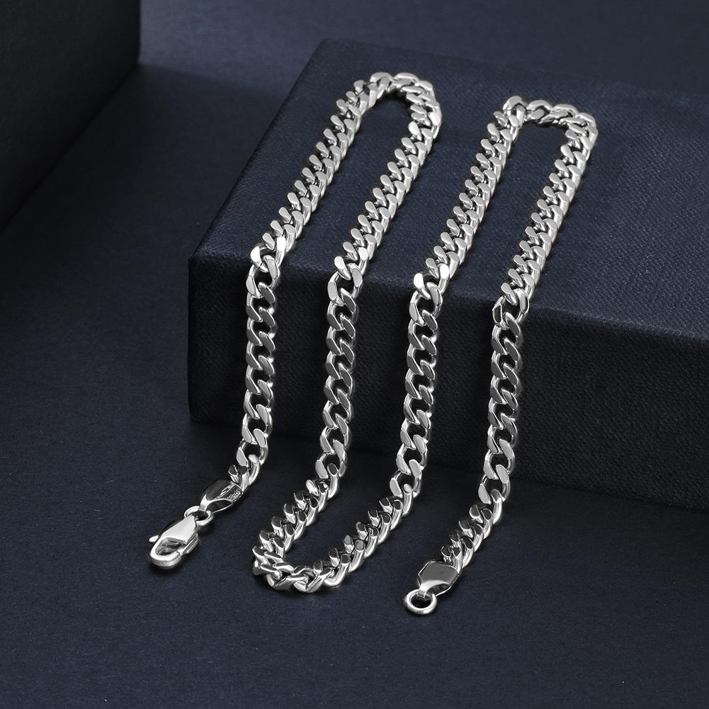 5mm Silver Hip Hop Cuban Chain Necklace made of durable stainless steel with gold plating, showcasing a stylish Cuban link design.