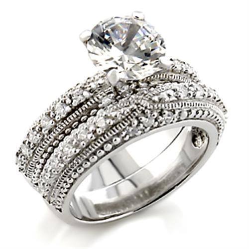 5X024 Rhodium Brass Ring featuring AAA Grade CZ stones, showcasing a brilliant clear sparkle against a polished surface.