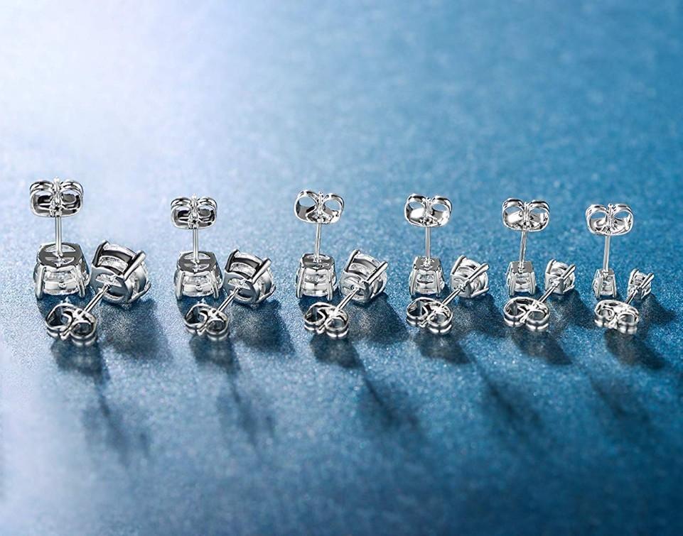 Elegant 6 Piece Graduating Classic Elements Studs in 14K White Gold Plated with princess cut white stones.