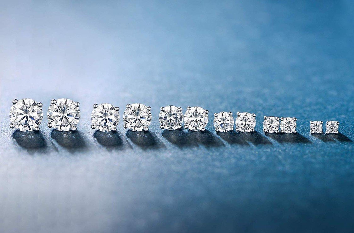 Elegant 6 Piece Graduating Classic Elements Studs in 14K White Gold Plated with princess cut white stones.