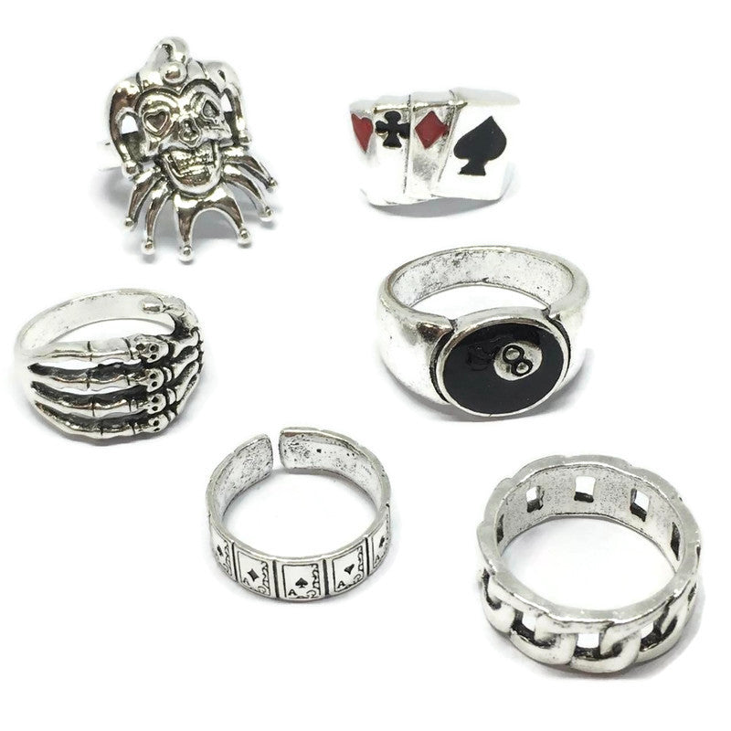 A stylish 6 Piece Jester Ring Set made of sterling silver plated steel alloy, featuring unique jester-themed designs.