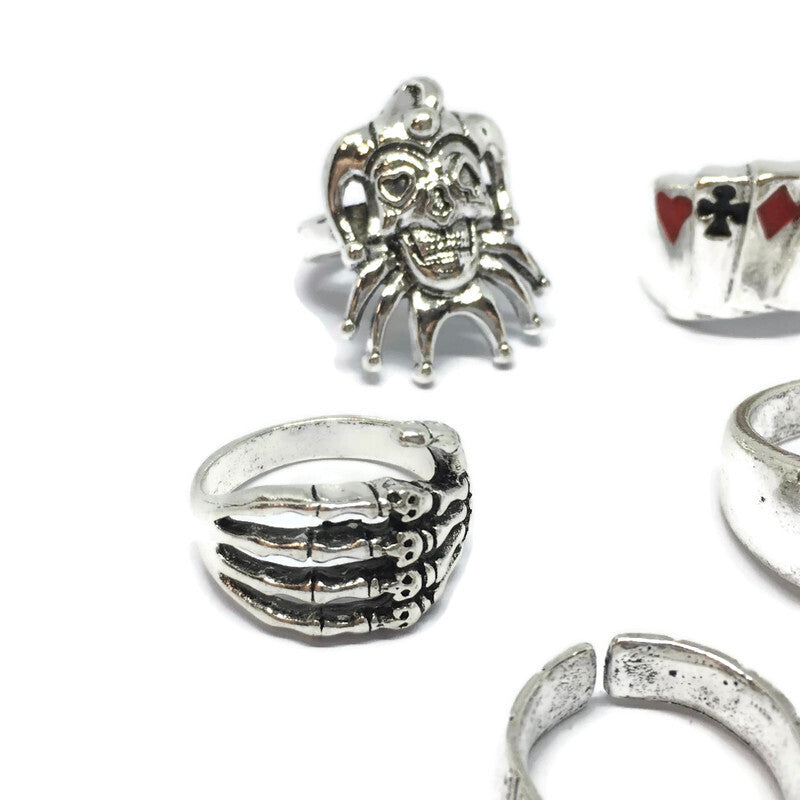 A stylish 6 Piece Jester Ring Set made of sterling silver plated steel alloy, featuring unique jester-themed designs.