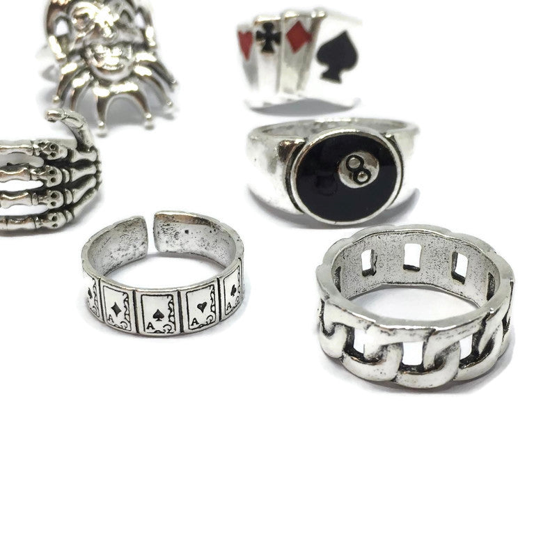 A stylish 6 Piece Jester Ring Set made of sterling silver plated steel alloy, featuring unique jester-themed designs.