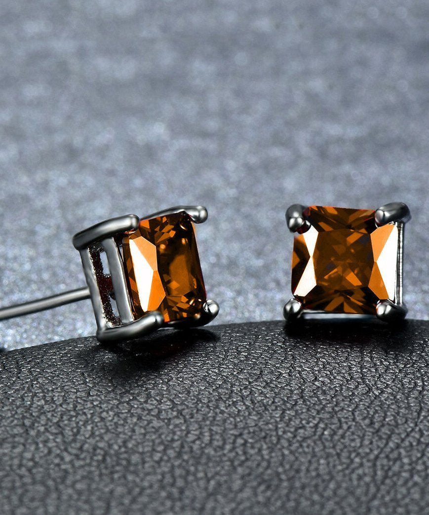 Elegant 6mm princess stud earrings featuring vibrant orange Austrian crystals set in 18K white gold, showcasing exquisite Italian craftsmanship.