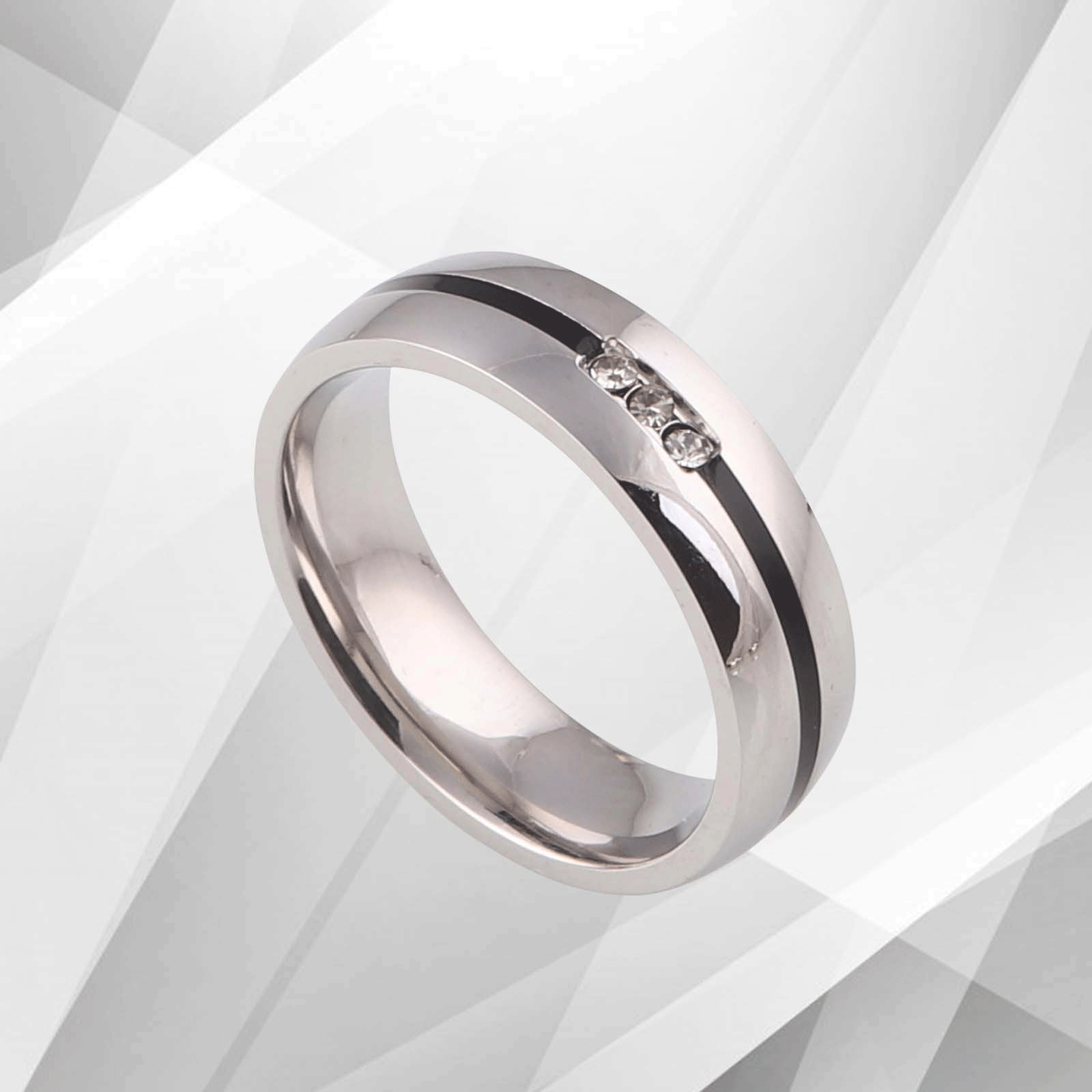 6mm wide titanium ring featuring three sparkling 0.35Ct CZ diamonds with an 18Ct white gold finish, designed for comfort and elegance.