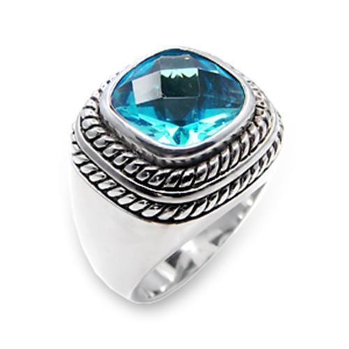 6X209 Rhodium 925 Sterling Silver Ring featuring a synthetic sea blue spinel, showcasing its elegant design and vibrant color.