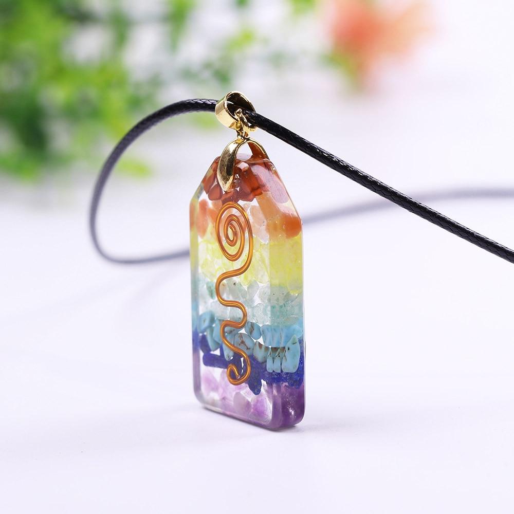 7 Chakra Crystal Stone Necklace featuring a colorful orgonite pendant with geometric design, made from resin and zinc alloy.