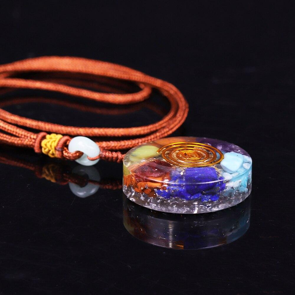 7 Chakra Orgone energy pendant necklace featuring healing stones and geometric design, ideal for EMF protection and meditation.