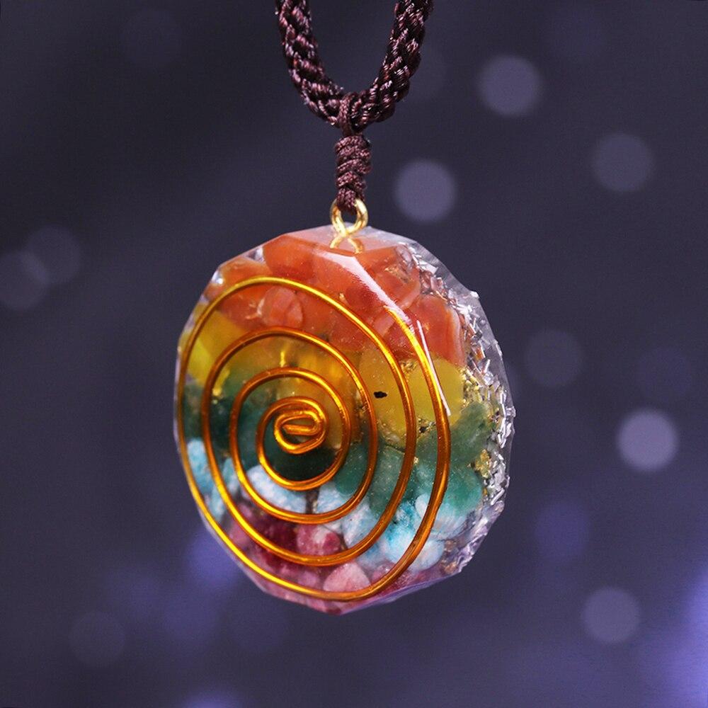 Colorful 7 Chakra Orgone Pendant Necklace featuring tumbled stones and geometric design, perfect for energy healing.