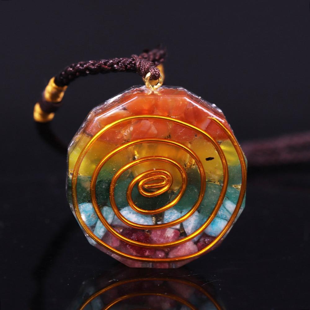 Colorful 7 Chakra Orgone Pendant Necklace featuring tumbled stones and geometric design, perfect for energy healing.