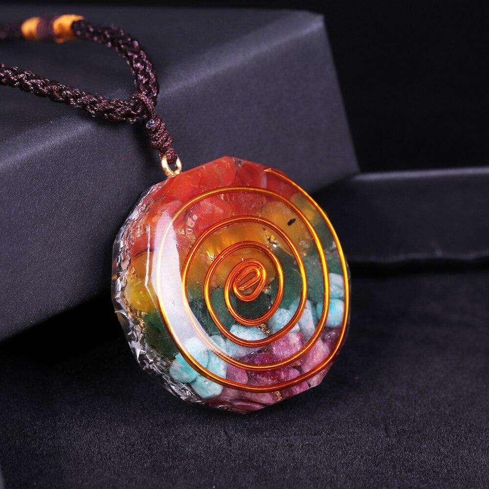 Colorful 7 Chakra Orgone Pendant Necklace featuring tumbled stones and geometric design, perfect for energy healing.