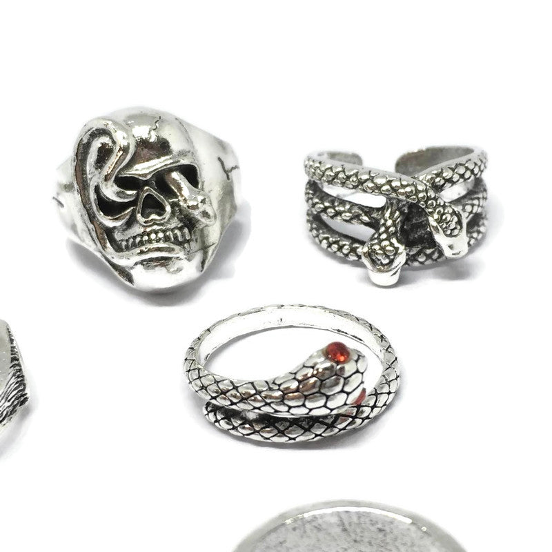 A stylish 7 Piece Spider Ring Set made of sterling silver plated steel alloy, featuring intricate spider designs.