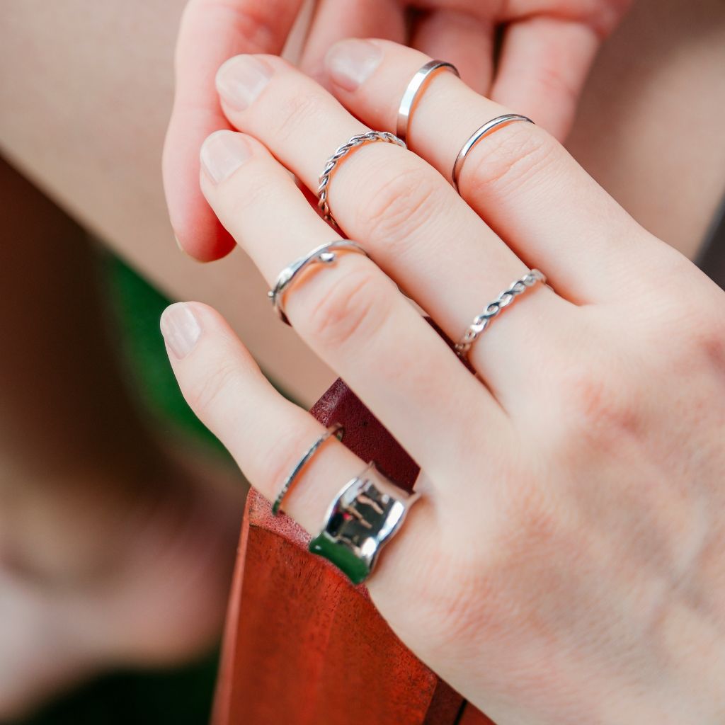 8 Piece Boho Ring Set featuring multi-size wide band stackable silver rings with unique designs and textures.