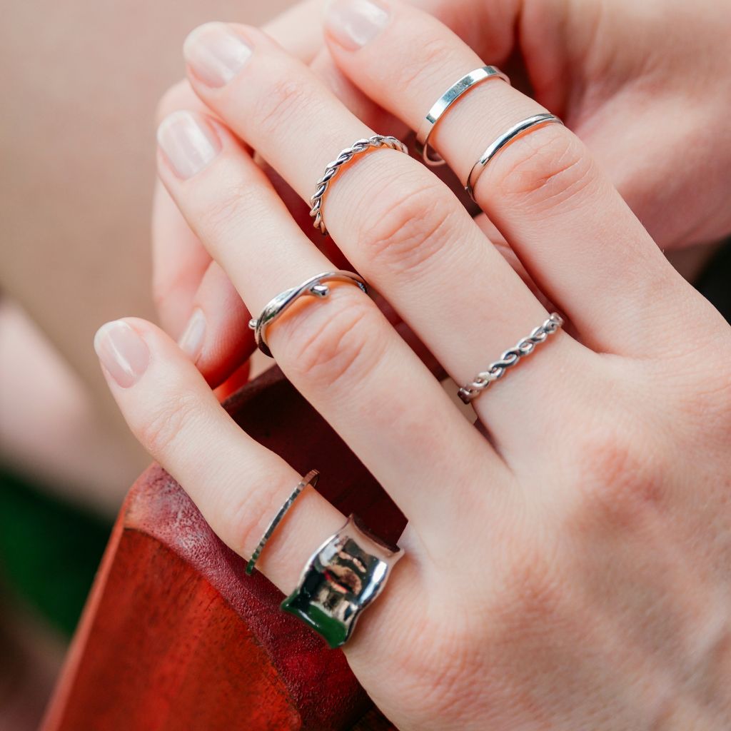 8 Piece Boho Ring Set featuring multi-size wide band stackable silver rings with unique designs and textures.