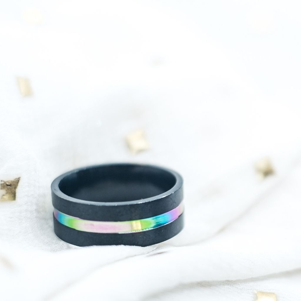 8mm Stainless Steel Unicorn Rainbow Unisex Thumb Band Ring showcasing a silver finish with colorful unicorn hues, perfect for both men and women.